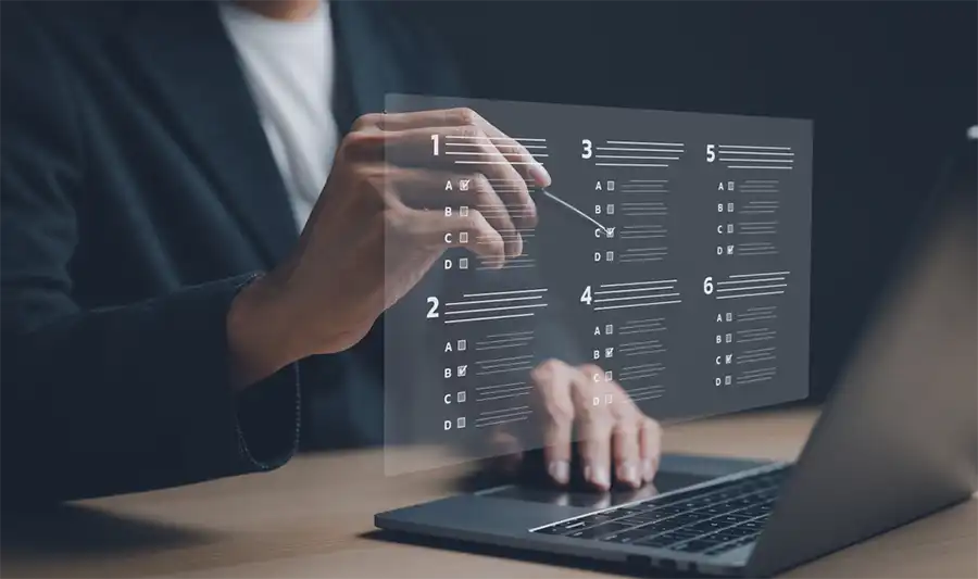 Businessman,With,Evaluating,Questionnaire,On,Online,Laptop,Computer.,Assessment,Survey
